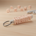 Cylinder rotating name keychain